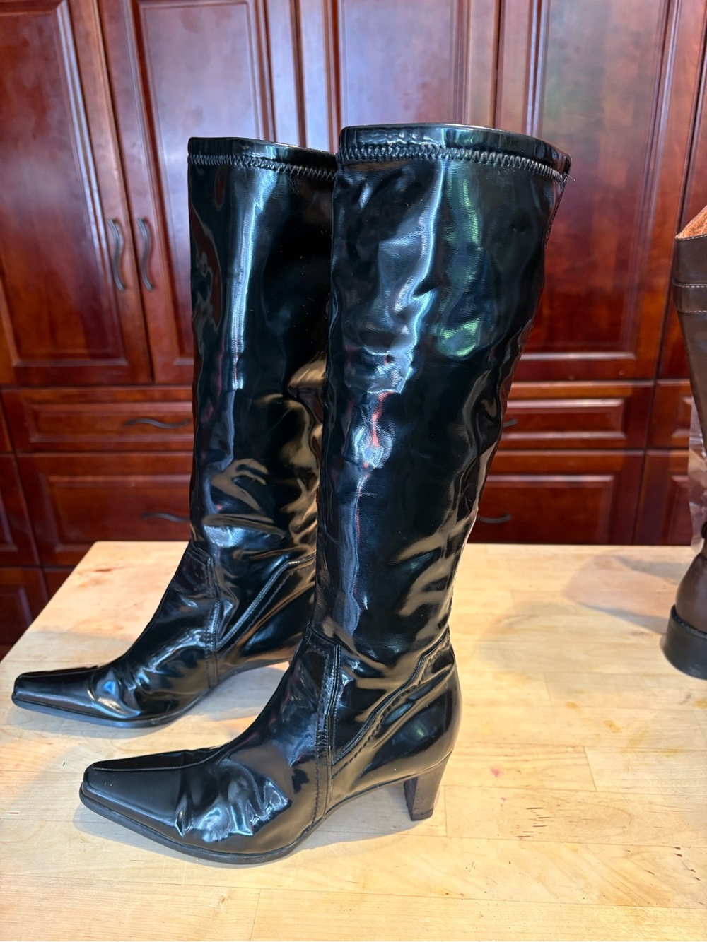 Glossy Black Patent Knee-High Heeled Boots